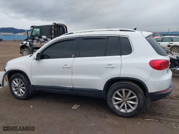 2017 Volkswagen Tiguan Wolfsburg Edition with VIN WVGSV7AX6HK003768, listed as a IAAI auction lot 41137411 with 117,862 mi miles. Bid and sale history available at carsss.com. Image 15.
