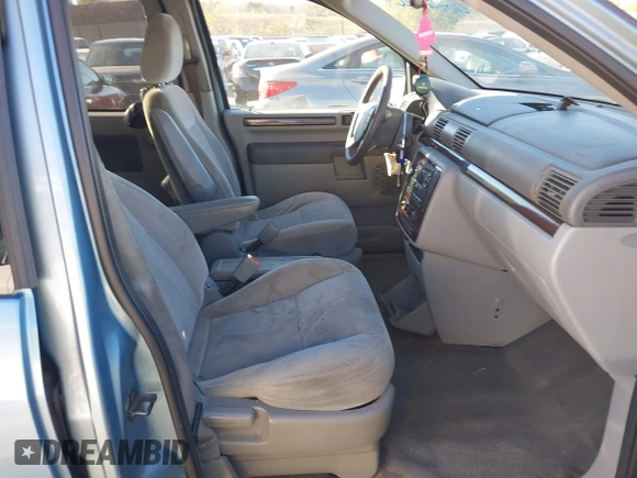 2007 Ford Freestar SEL z VIN 2FMZA522X7BA34970, wystawiony jako IAAI lot #40849269 z przebiegiem 261 928 mil mil oraz . Historia ofert i sprzedaży dostępna na DreamBid. Obrazek 5.