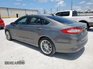 2013 Ford Fusion SE Hybrid with VIN 3FA6P0LU8DR261232, listed as a Copart auction lot 60674105 with 132,901 mi miles and Clean title. Bid and sale history available at DreamBid. Image 2.
