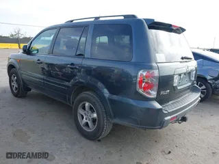 2006 Honda Pilot EX-L with VIN 2HKYF18536H538744, listed as a IAAI auction lot 42025277 with 203,012 mi miles. Bid and sale history available at carsss.com. Image 3.