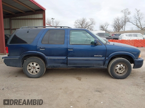 2000 GMC Jimmy SLE Convenience z VIN 1GKDT13W8Y2340743, wystawiony jako IAAI lot #41393906 z przebiegiem 196 520 mil mil oraz . Historia ofert i sprzedaży dostępna na DreamBid. Obrazek 14.
