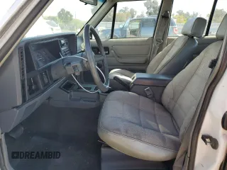 1994 Jeep Cherokee Sport with VIN 1J4FT68S2RL189475, listed as a Copart auction lot 53697465 with 188,210 mi miles and Clean Title. Bid and sale history available at carsss.com. Image 7.