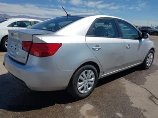 2010 Kia Forte EX with VIN KNAFU4A29A5195670, listed as a IAAI auction lot 42075961 with 160,648 mi miles. Bid and sale history available at carsss.com. Image 4.