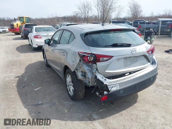 2015 Mazda 3 i Touring with VIN 3MZBM1L77FM138326, listed as a IAAI auction lot 41839685 with 97,506 mi miles and . Bid and sale history available at carsss.com. Image 3.