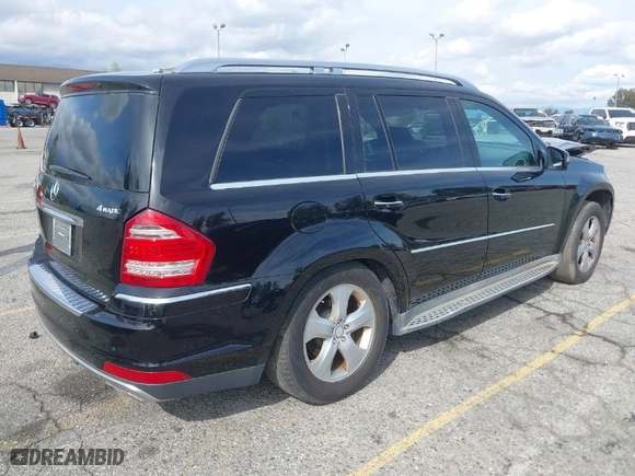 2012 Mercedes-Benz GL-Class GL 450 with VIN 4JGBF7BE6CA785983, listed as a IAAI auction lot 41870613 with 75,004 mi miles. Bid and sale history available at carsss.com. Image 4.