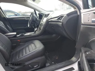 2016 Ford Fusion SE with VIN 3FA6P0T99GR268237, listed as a IAAI auction lot 41951459 with 117,309 mi miles. Bid and sale history available at carsss.com. Image 5.