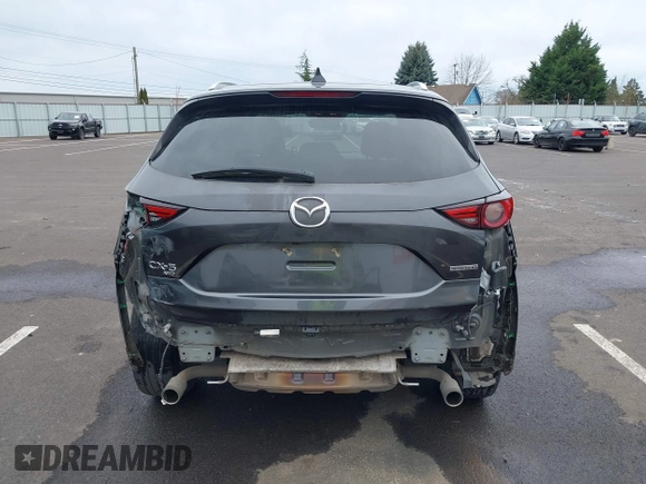 2020 Mazda CX-5 Grand Touring with VIN JM3KFBDM4L0829861, listed as a IAAI auction lot 41826250 with 62,091 mi miles and . Bid and sale history available at carsss.com. Image 17.