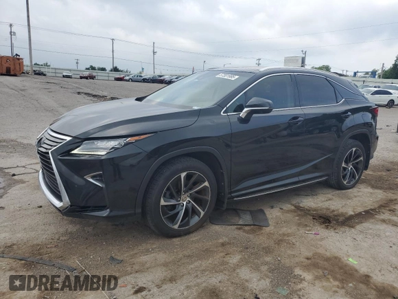 2017 Lexus RX 350 with VIN 2T2BZMCA9HC129460, listed as a Copart auction lot 57301995 with 163,128 mi miles and Salvage title. Bid and sale history available at DreamBid. Image 1.