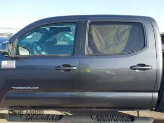 2023 Toyota Tacoma 4WD SR with VIN 3TMCZ5AN7PM587833, listed as a IAAI auction lot 41853887 with 16,532 mi miles. Bid and sale history available at carsss.com. Image 14.