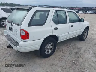 2000 Isuzu Rodeo S z VIN 4S2CK58W0Y4342098, wystawiony jako IAAI lot #42305343 z przebiegiem 150 367 mil mil oraz . Historia ofert i sprzedaży dostępna na DreamBid. Obrazek 4.