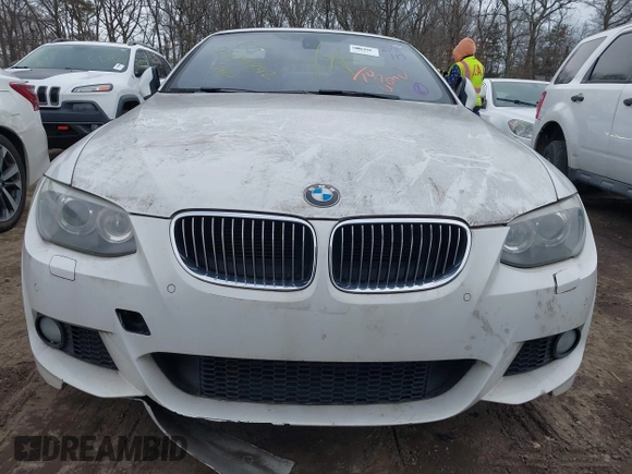 2011 BMW 3 Series 335i with VIN WBADX7C51BE742780, listed as a IAAI auction lot 41636961 with Not Provided miles and . Bid and sale history available at carsss.com. Image 11.