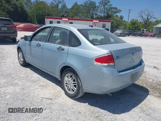 2009 Ford Focus SE with VIN 1FAHP35N19W232918, listed as a IAAI auction lot 42076066 with 165,953 mi miles. Bid and sale history available at carsss.com. Image 3.