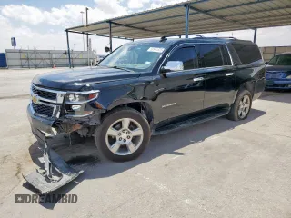 2015 Chevrolet Suburban LS z VIN 1GNSCHKC2FR707277, wystawiony jako Copart lot #59541635 z przebiegiem 198 876 mil mil oraz Szkoda całkowita • Salvage title. Historia ofert i sprzedaży dostępna na DreamBid. Obrazek 1.