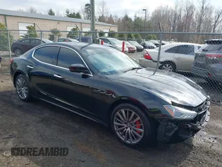 2017 Maserati Ghibli with VIN ZAM57XSA4H1229668, listed as a IAAI auction lot 41750431 with 49,333 mi miles. Bid and sale history available at carsss.com. Image 1.