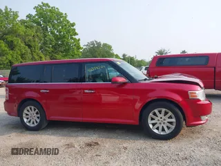2012 Ford Flex SEL z VIN 2FMGK5CC2CBD11231, wystawiony jako IAAI lot #42399504 z przebiegiem 198 592 mil mil oraz . Historia ofert i sprzedaży dostępna na DreamBid. Obrazek 13.