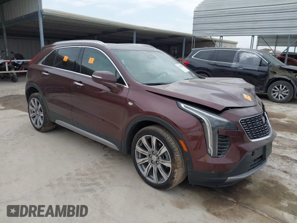 2022 Cadillac XT4 FWD Premium Luxury with VIN 1GYFZCR4XNF116845, listed as a IAAI auction lot 42128210 with 43,423 mi miles and . Bid and sale history available at DreamBid. Image 1.