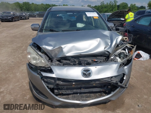 2014 Mazda 5 Sport with VIN JM1CW2BL6E0164195, listed as a IAAI auction lot 42455158 with 155,007 mi miles and . Bid and sale history available at DreamBid. Image 18.