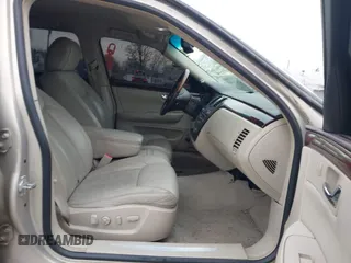 2009 Cadillac DTS w/1SA with VIN 1G6KD57Y29U137410, listed as a IAAI auction lot 42026044 with 112,916 mi miles. Bid and sale history available at carsss.com. Image 5.