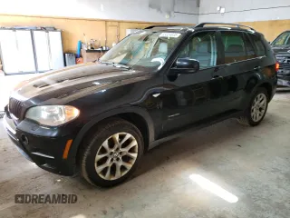 2012 BMW X5 35i with VIN 5UXZV4C58CL754689, listed as a Copart auction lot 63024635 with 179,794 mi miles and Clean title. Bid and sale history available at DreamBid. Image 1.