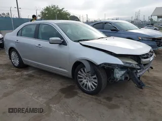 2012 Ford Fusion Hybrid with VIN 3FADP0L38CR247764, listed as a IAAI auction lot 42417366 with 165,176 mi miles and . Bid and sale history available at DreamBid. Image 1.