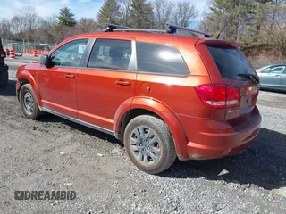 2014 Dodge Journey SE with VIN 3C4PDCAB8ET277669, listed as a IAAI auction lot 41542587 with 158,005 mi miles. Bid and sale history available at carsss.com. Image 3.