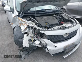 2010 Toyota Corolla with VIN 1NXBU4EE4AZ179951, listed as a IAAI auction lot 42136926 with 148,383 mi miles. Bid and sale history available at carsss.com. Image 6.