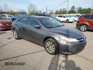2015 Toyota Camry XLE with VIN 4T1BF1FK6FU935865, listed as a Copart auction lot 53271435 with 104,281 mi miles and Salvage Title. Bid and sale history available at DreamBid. Image 4.