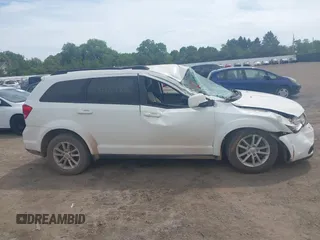 2017 Dodge Journey SXT z VIN 3C4PDCBG8HT534473, wystawiony jako IAAI lot #42351286 z przebiegiem 127 917 mil mil oraz . Historia ofert i sprzedaży dostępna na DreamBid. Obrazek 13.