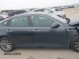 2017 Kia Optima LX z VIN 5XXGT4L33HG131596, wystawiony jako IAAI lot #41591166 z przebiegiem 105 084 mil mil oraz . Historia ofert i sprzedaży dostępna na DreamBid. Obrazek 13.
