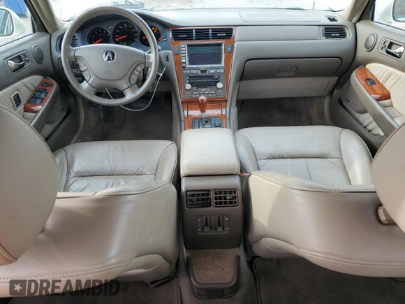 2004 Acura RL w/Navigation System z VIN JH4KA96674C007925, wystawiony jako Copart lot #56732645 z przebiegiem 188 312 mil mil oraz Szkoda całkowita • Salvage title. Historia ofert i sprzedaży dostępna na DreamBid. Obrazek 8.