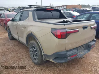2023 Hyundai Santa Cruz SEL Premium z VIN 5NTJDDAF7PH046605, wystawiony jako IAAI lot #41488316 z przebiegiem 68 562 mil mil oraz . Historia ofert i sprzedaży dostępna na DreamBid. Obrazek 3.