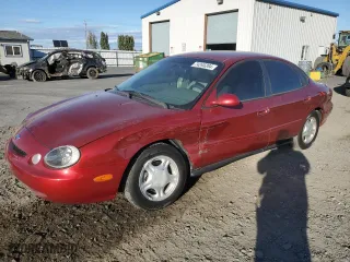 1997 Ford Taurus GL with VIN 1FALP52U6VA301952, listed as a Copart auction lot 74245204 with 152,562 mi miles and Salvage Title. Bid and sale history available at carsss.com. Image 1.