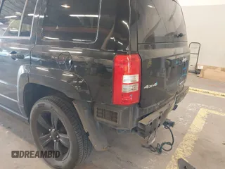 2014 Jeep Patriot Limited with VIN 1C4NJRCB4ED629085, listed as a IAAI auction lot 39414215 with 87,409 mi miles. Bid and sale history available at carsss.com. Image 14.