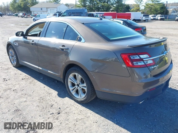 2015 Ford Taurus SEL with VIN 1FAHP2E83FG206055, listed as a IAAI auction lot 41943670 with 90,808 mi miles and . Bid and sale history available at carsss.com. Image 3.