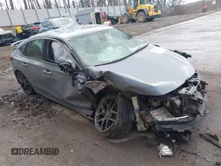 2023 Honda Civic Sport Touring z VIN 19XFL1H84PE009920, wystawiony jako IAAI lot #42032537 z przebiegiem Nie podano mil oraz . Historia ofert i sprzedaży dostępna na DreamBid. Obrazek 1.