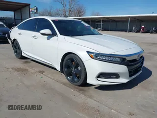 2018 Honda Accord Touring z VIN 1HGCV1F96JA144076, wystawiony jako IAAI lot #41561688 z przebiegiem 125 539 mil mil oraz . Historia ofert i sprzedaży dostępna na DreamBid. Obrazek 1.
