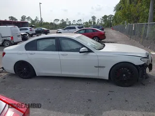 2013 BMW 7 Series 740i with VIN WBAYA6C52DD143862, listed as a IAAI auction lot 41859183 with 133,666 mi miles. Bid and sale history available at carsss.com. Image 14.