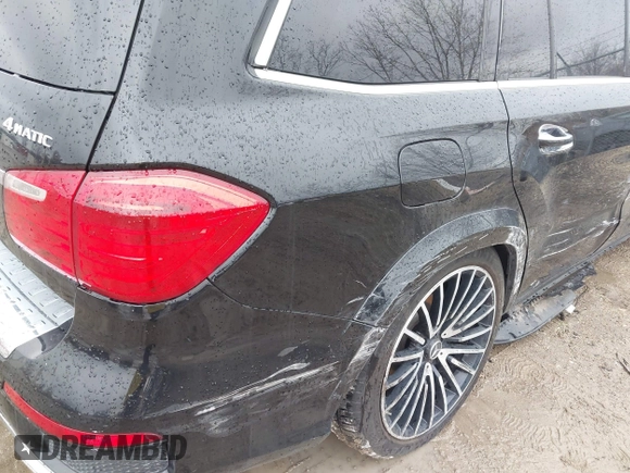 2014 Mercedes-Benz GL-Class GL 550 with VIN 4JGDF7DE1EA274612, listed as a IAAI auction lot 41710174 with 105,094 mi miles. Bid and sale history available at carsss.com. Image 18.