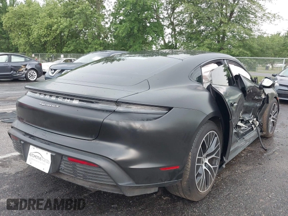 2021 Porsche Taycan 4S z VIN WP0AB2Y13MSA43638, wystawiony jako IAAI lot #42638298 z przebiegiem 27 634 mil mil oraz . Historia ofert i sprzedaży dostępna na DreamBid. Obrazek 4.