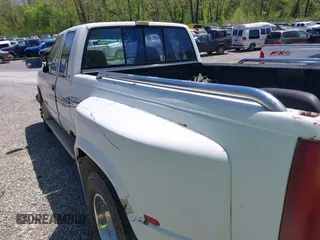 1991 GMC Sierra 1500 with VIN 2GTHC39N2M1512024, listed as a IAAI auction lot 42133143 with 216,701 mi miles and . Bid and sale history available at DreamBid. Image 3.
