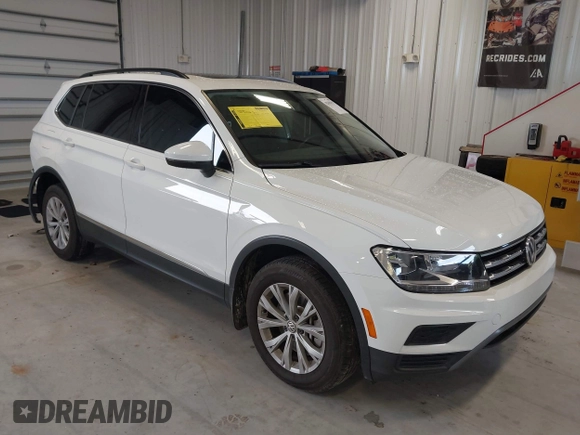 2018 Volkswagen Tiguan SEL z VIN 3VV3B7AX1JM167656, wystawiony jako IAAI lot #42658377 z przebiegiem 74 130 mil mil oraz . Historia ofert i sprzedaży dostępna na DreamBid. Obrazek 1.