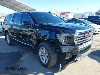 2021 GMC Yukon XL SLT with VIN 1GKS2GKD0MR471504, listed as a IAAI auction lot 41668145 with 55,917 mi miles. Bid and sale history available at carsss.com. Image 1.