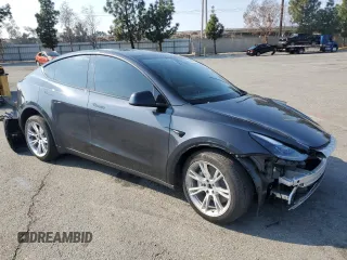 2024 Tesla Model Y Long Range with VIN 7SAYGAEE0RF018427, listed as a Copart auction lot 42455075 with 13,347 mi miles and Salvage Title. Bid and sale history available at DreamBid. Image 4.