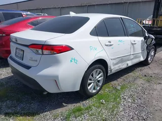 2024 Toyota Corolla Hybrid LE with VIN JTDBCMFE3R3050333, listed as a IAAI auction lot 41608560 with 8,649 mi miles. Bid and sale history available at carsss.com. Image 4.