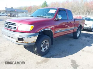 2000 Toyota Tundra SR5 with VIN 5TBBT4411YS065998, listed as a IAAI auction lot 42142231 with 171,340 mi miles and . Bid and sale history available at DreamBid. Image 2.