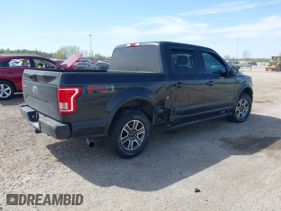 2015 Ford F-150 XLT with VIN 1FTEW1EG3FKE16010, listed as a IAAI auction lot 42107938 with 242,625 mi miles and . Bid and sale history available at DreamBid. Image 4.