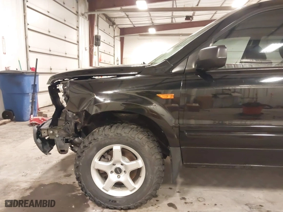 2007 Honda Pilot LX with VIN 5FNYF18117B009290, listed as a IAAI auction lot 41205310 with 150,081 mi miles. Bid and sale history available at carsss.com. Image 19.