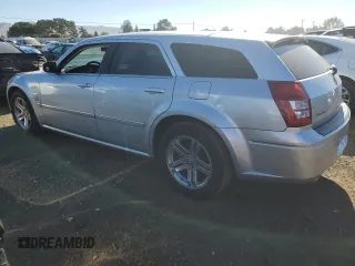 2005 Dodge Magnum RT z VIN 2D8GV582X5H549468, wystawiony jako Copart lot #77535504 z przebiegiem 200 963 mil mil oraz Szkoda całkowita • Salvage title. Historia ofert i sprzedaży dostępna na DreamBid. Obrazek 2.