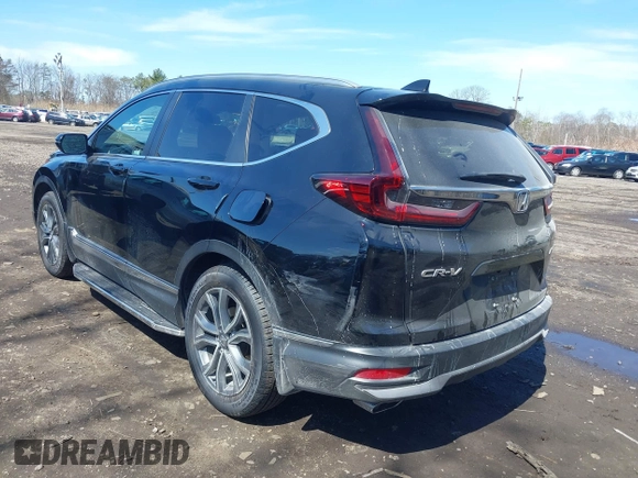 2020 Honda CR-V Touring with VIN 2HKRW2H98LH660573, listed as a IAAI auction lot 41524610 with 37,493 mi miles and . Bid and sale history available at DreamBid. Image 3.
