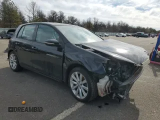 2012 Volkswagen Golf TDI with VIN WVWNM7AJ8CW302793, listed as a Copart auction lot 45277555 with 128,113 mi miles and Salvage title. Bid and sale history available at DreamBid. Image 4.